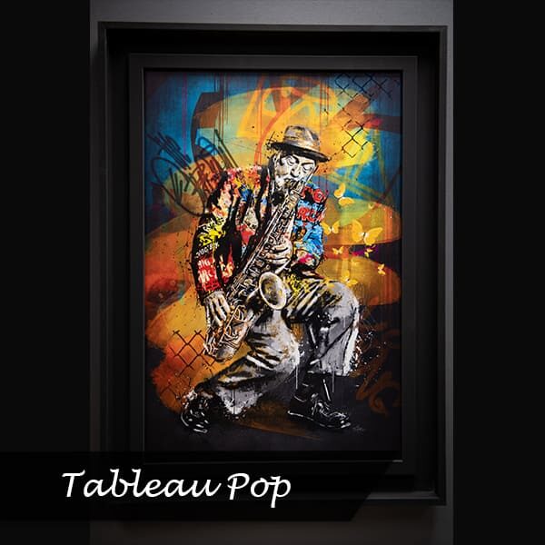 Tableau pop art d'un homme qui joue du saxophone chez Histoire de Fauteuils à Châteaubriant